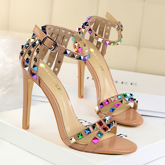 Open-toe sandals with cutout colorful studs