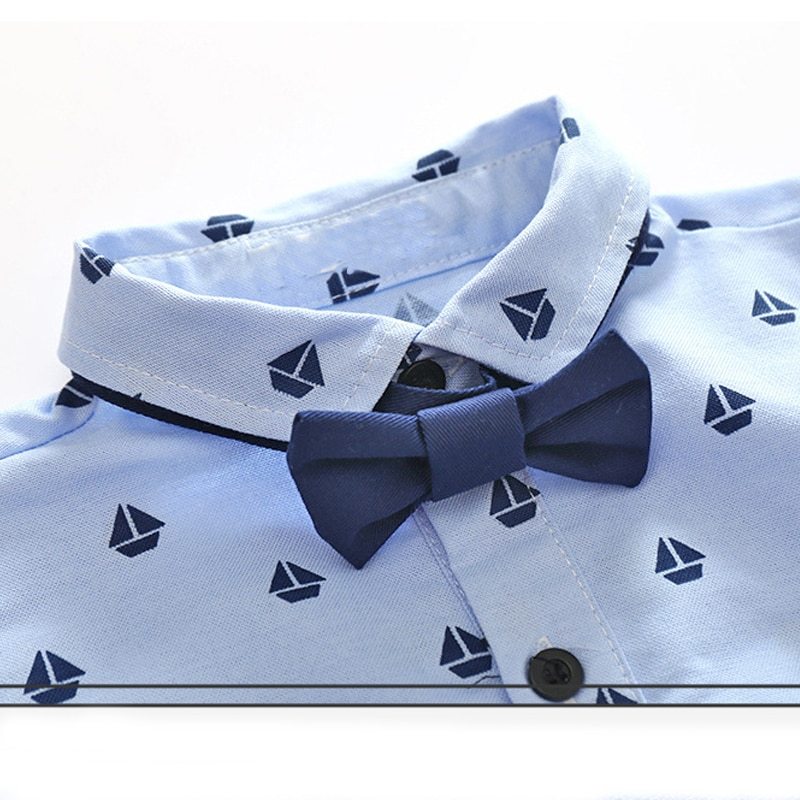 Young boy bow tie gentleman vest